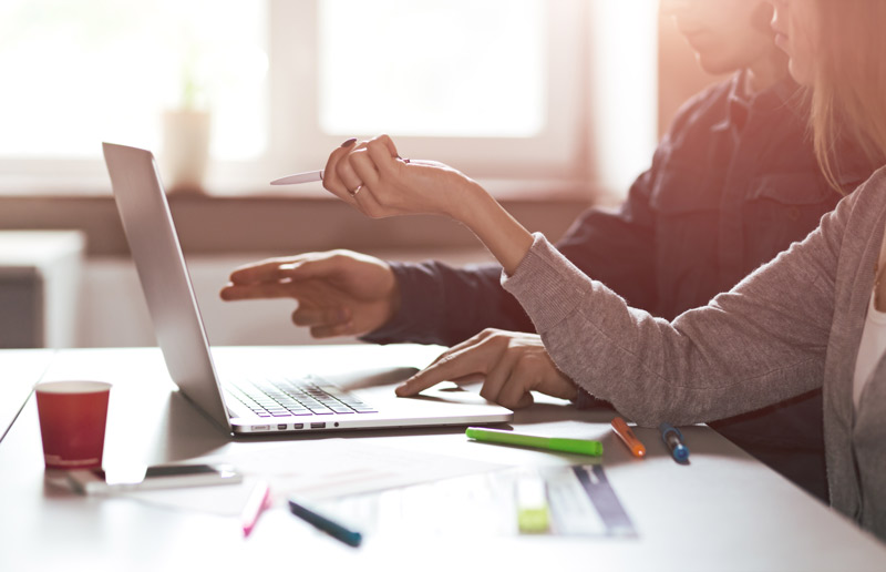 image of people on laptop